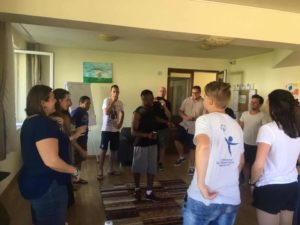Kanaar running a workshop with a small group